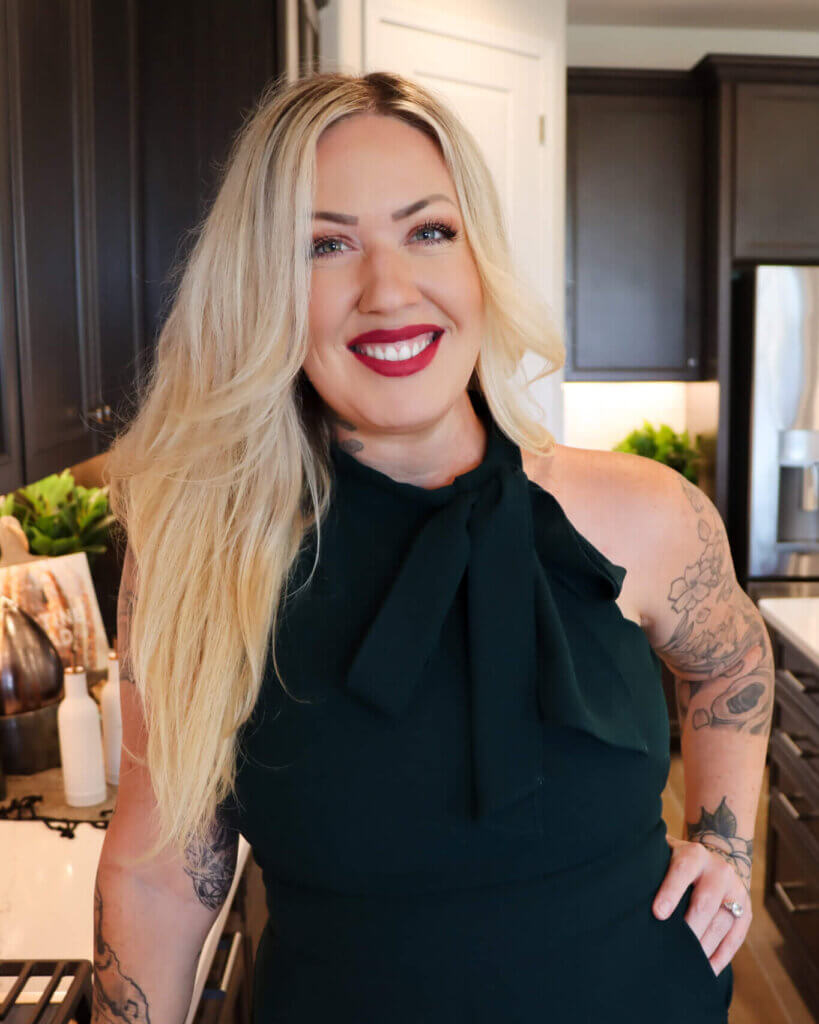 A military relocation professional is standing in the kitchen of a new home